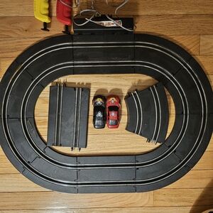 Vintage Electric Slot Car Race Track Set with Red and Black Car